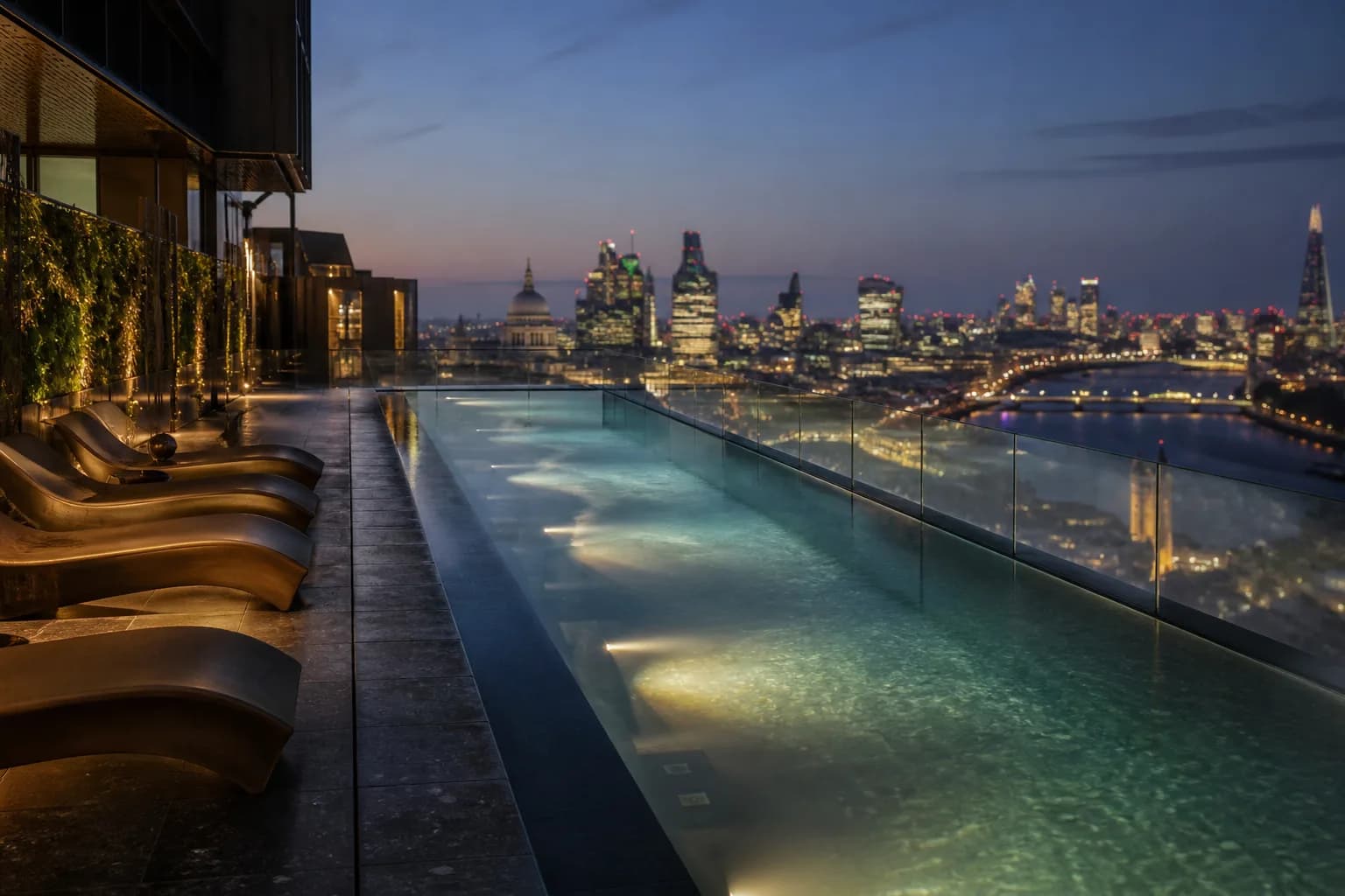 Rooftop infinity pool at dusk